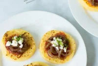 Golden Polenta with Balsamic-Glazed Onions, Savory Tomato Sauce, and Crumbled Feta