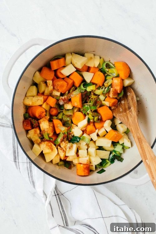 Velvety Carrot Leek Soup 11 Sautéing vegetables in a dutch oven.