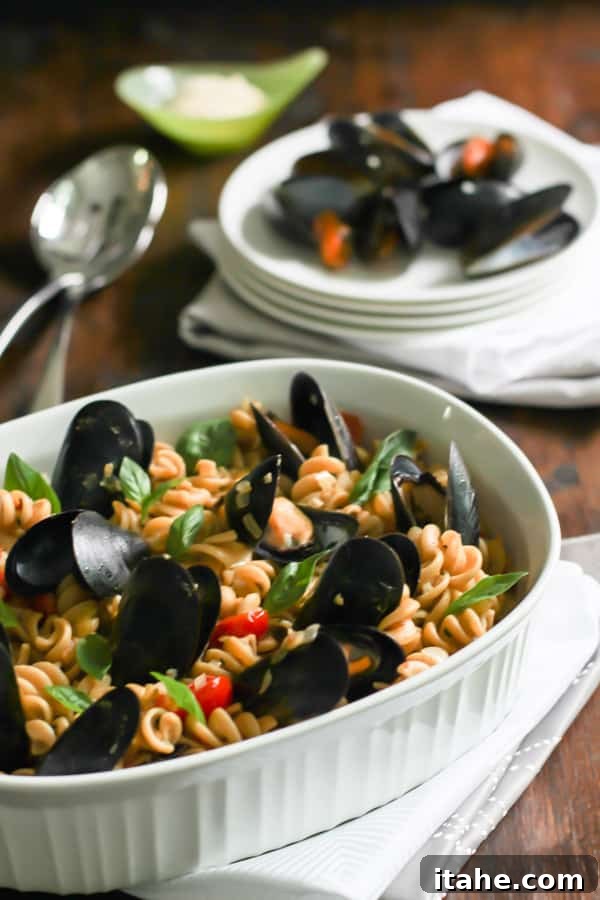 Whole Wheat Fusilli with Mussels A beautifully plated dish of Whole Wheat Fusilli with Mussels, showcasing fresh seafood and pasta.