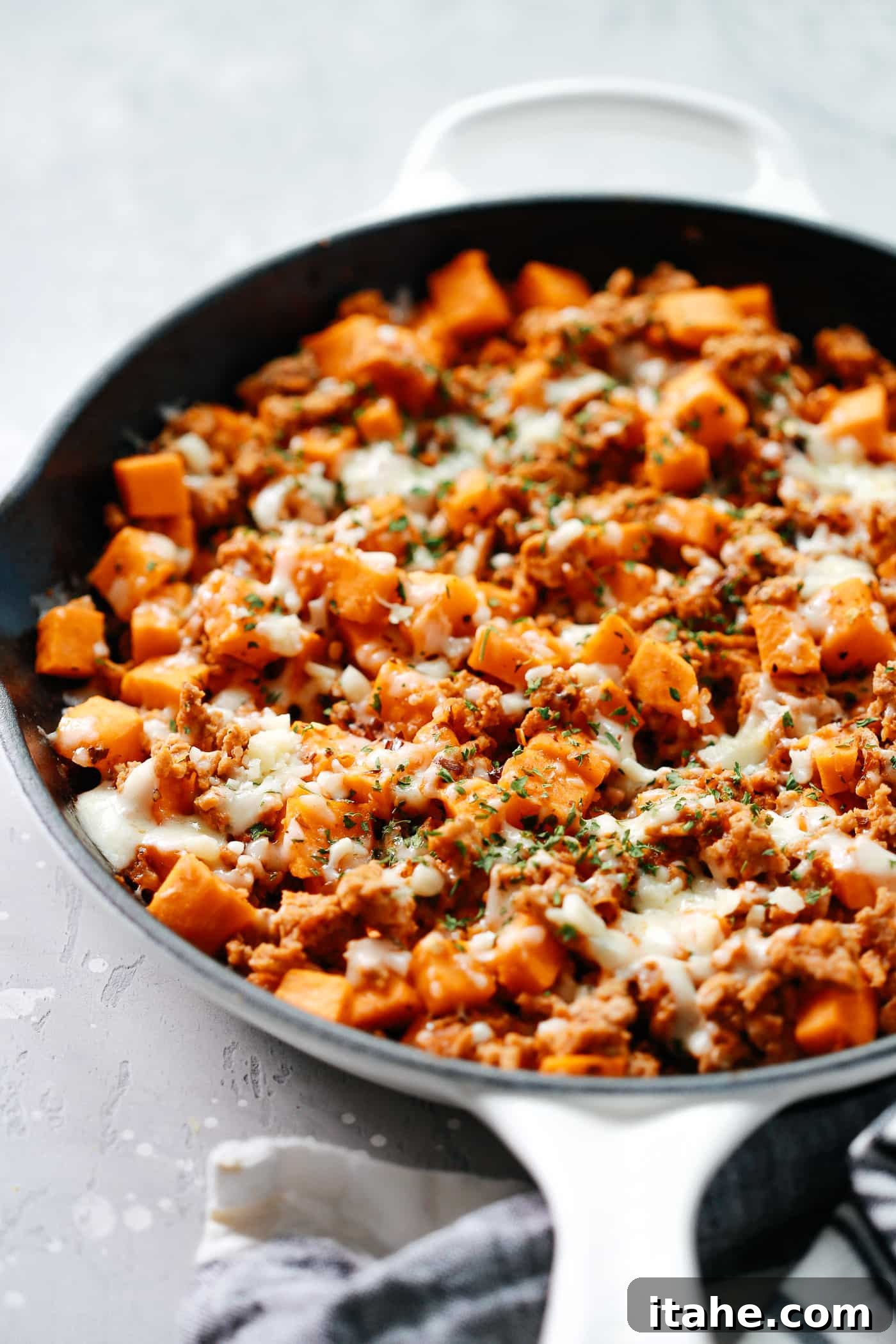 Close-up of a bubbling Ground Turkey Sweet Potato Skillet, ready to be served