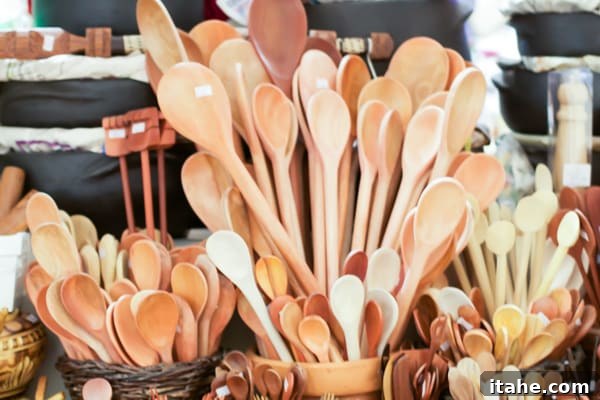 Brazilian Feiras: A Taste of Local Life 14 A charming display of handmade wooden spoons of varying sizes, elegantly arranged in traditional terra cotta pots and woven baskets.