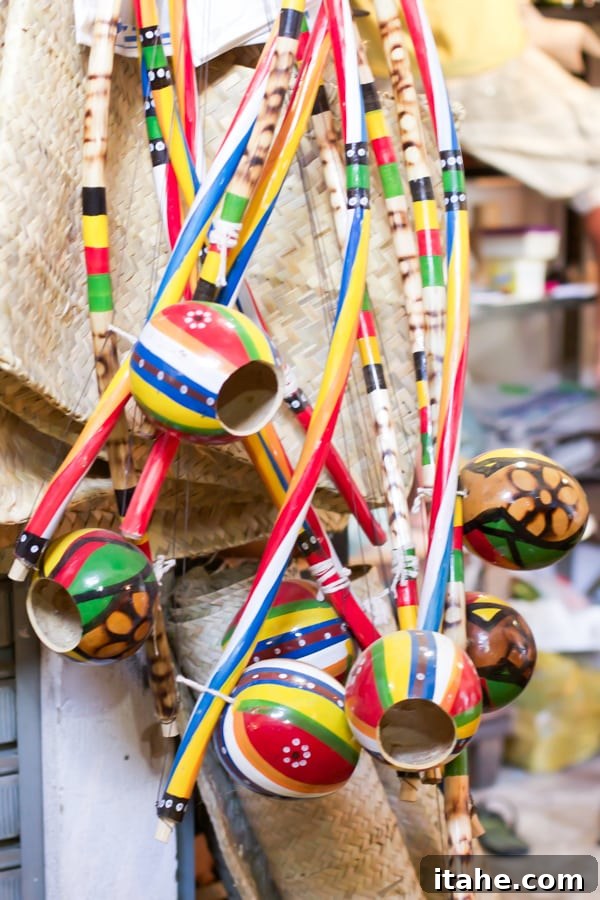 Brazilian Feiras: A Taste of Local Life 17 Colorful Birimbau percussion instruments, beautifully handcrafted and hanging for display in a vibrant Brazilian farmers' market stall.
