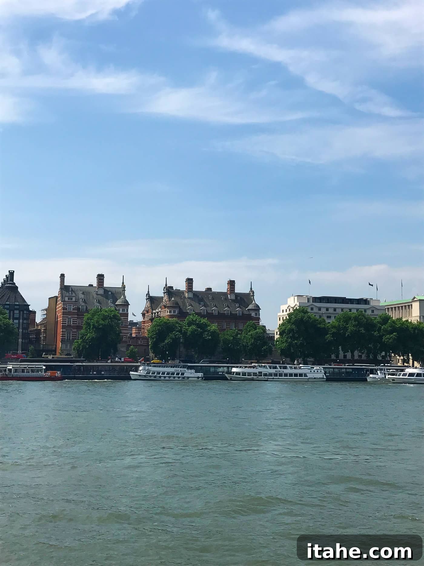 The serene River Thames reflecting the London cityscape