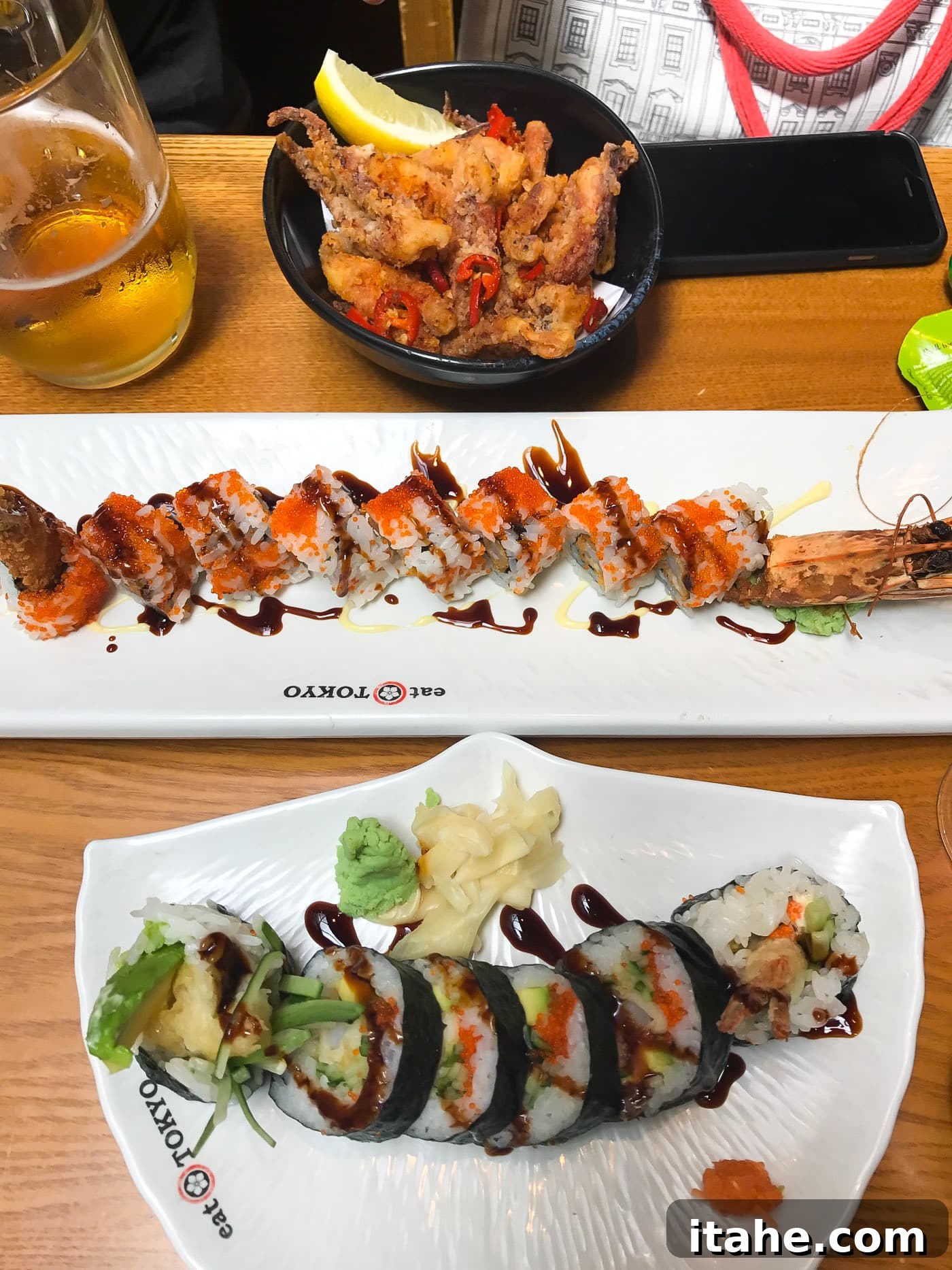 Overhead view of a delicious sushi spread on a wooden table, a culinary treat