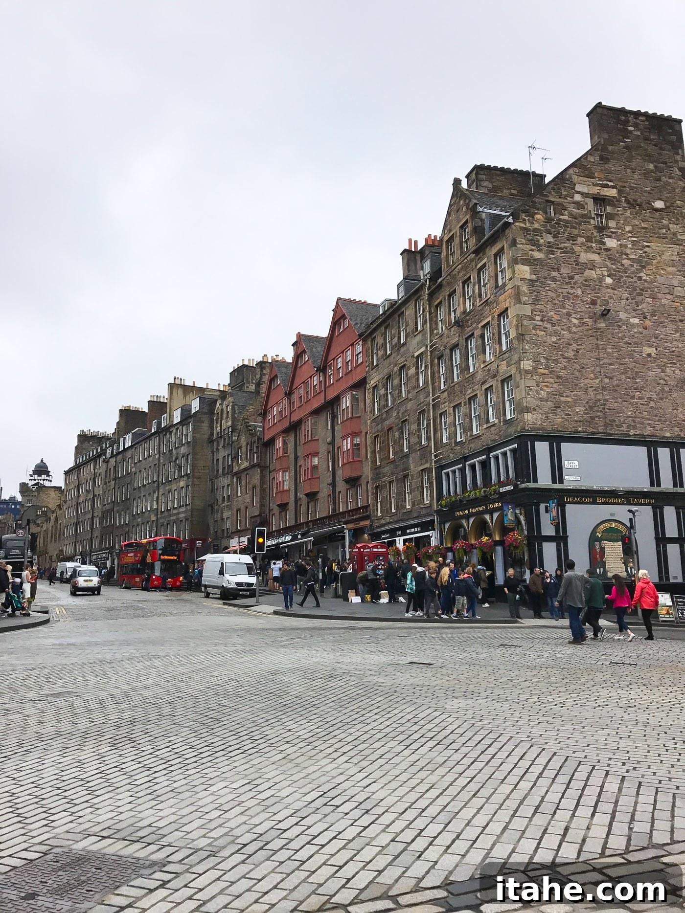 A quaint Edinburgh street featuring charming, historic buildings