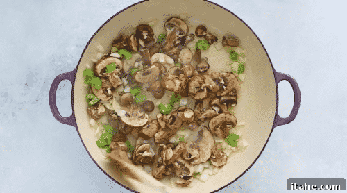 Low-Carb Cauliflower Rice 10 Mushrooms cooking in a skillet