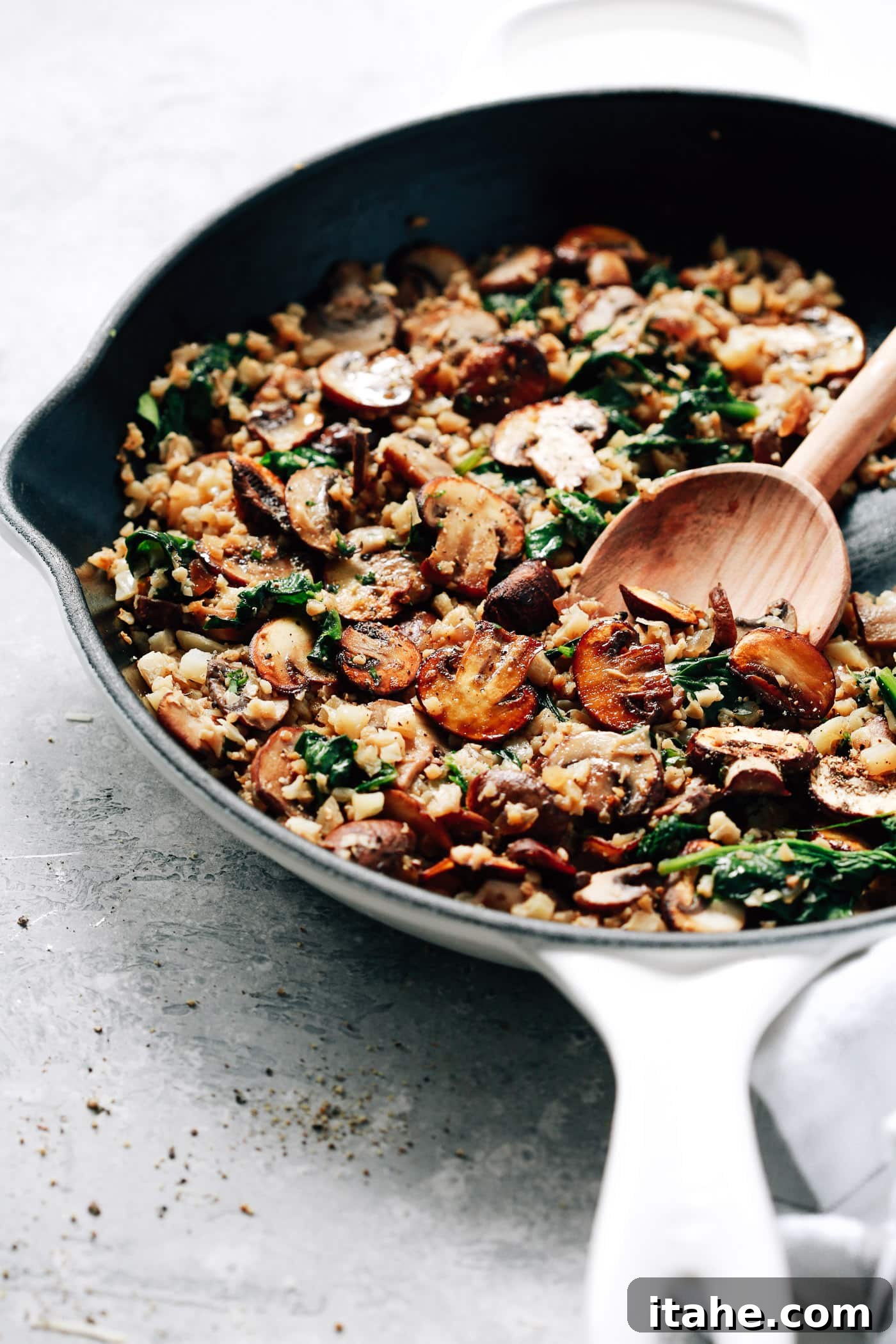 Low-Carb Cauliflower Rice 3 closeup view of mushrooms, spinach and cauliflower