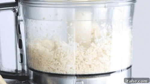 Low-Carb Cauliflower Rice 7 Cauliflower being riced in a food processor