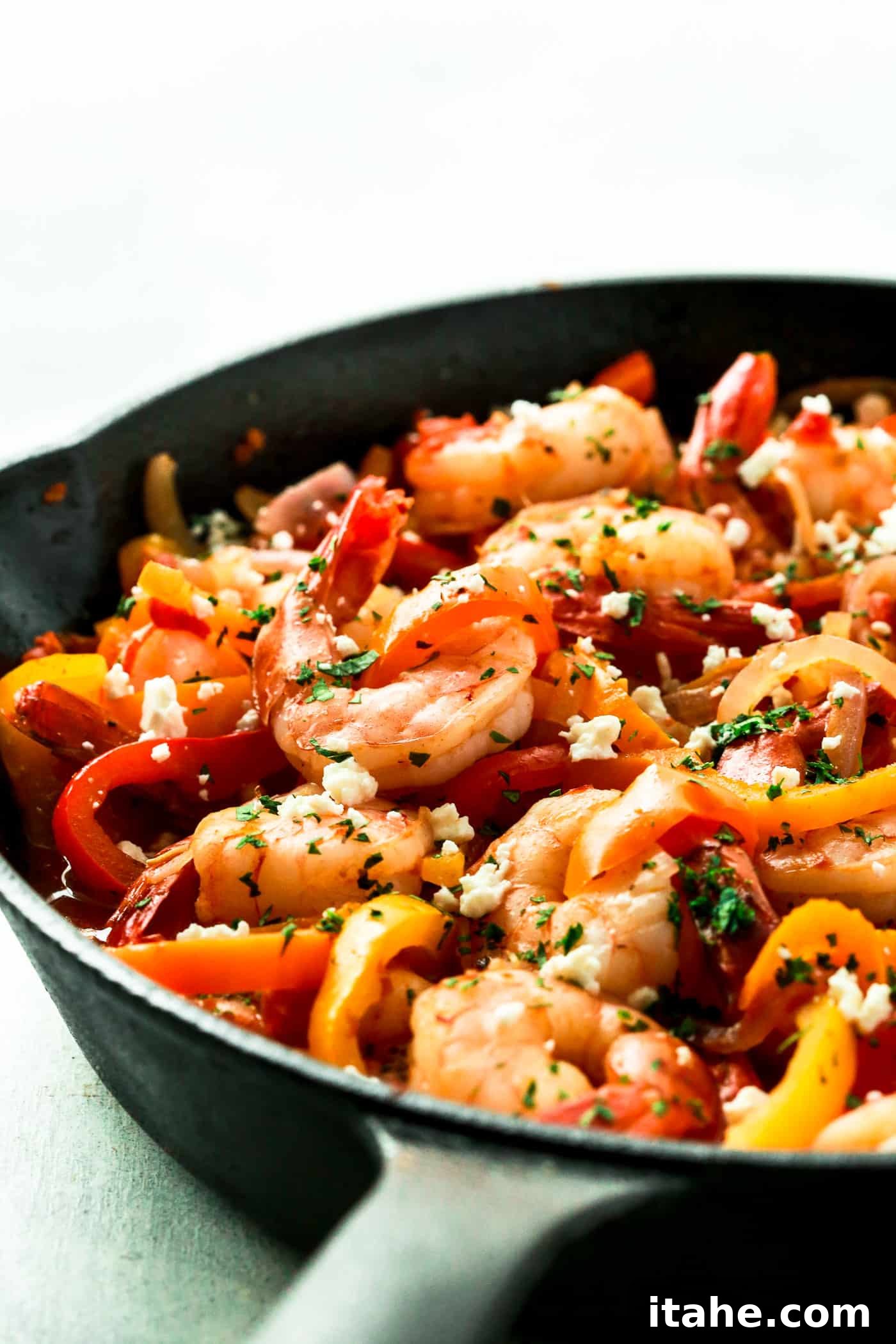 Shrimp, Bell Pepper and Onions Skillet - close up of fresh cooked shrimp and vegetables