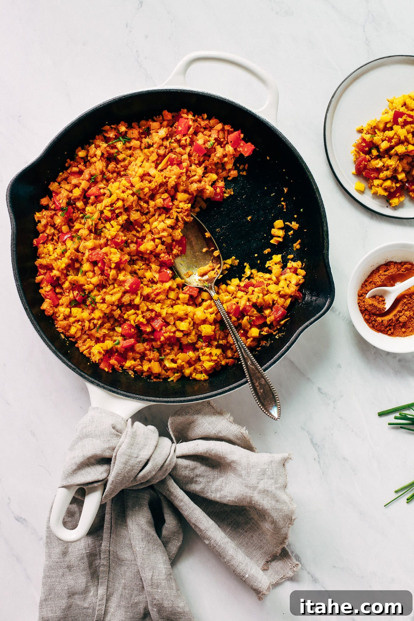 A closer view of golden cauliflower rice, showing its texture and vibrant color.
