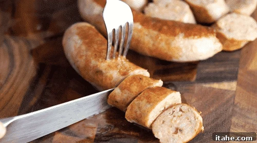 cutting sausage in a wooden cutting board