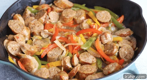 Finished Italian sausage and peppers in a skillet