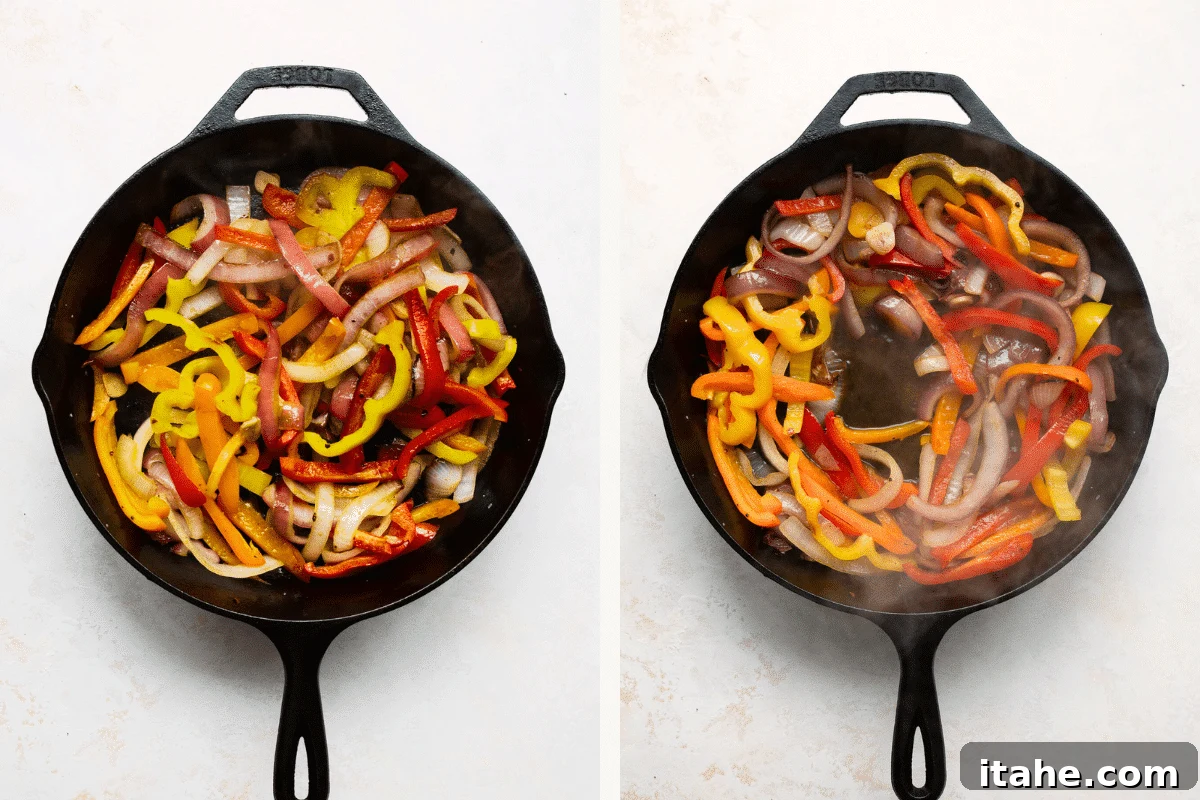 overhead view of bell pepper and onions sautéing in a cast iron skillet. 