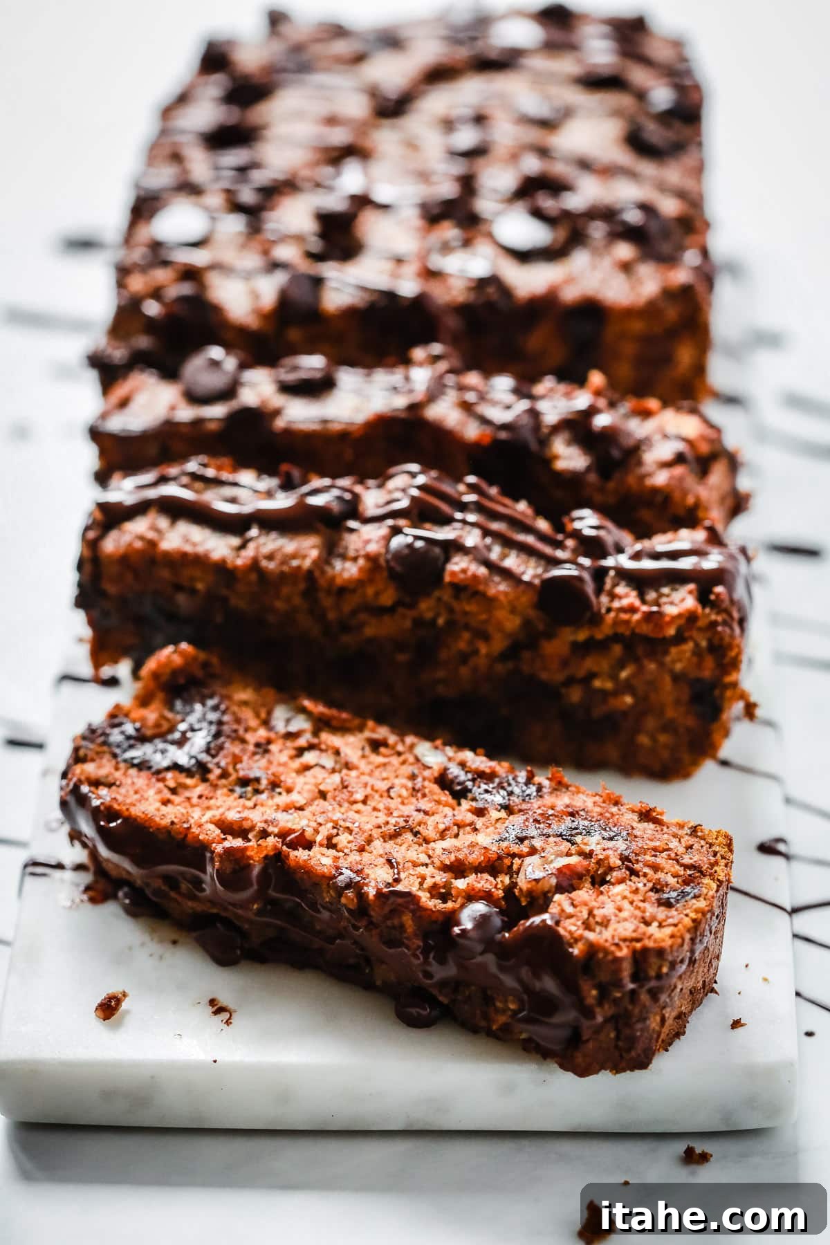 Nutty Autumn Pumpkin Bread 3 Slices of Easy Low-carb Pumpkin Bread, showing moist texture and chocolate chips