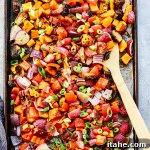 overhead view of roasted vegetables on sheet pan