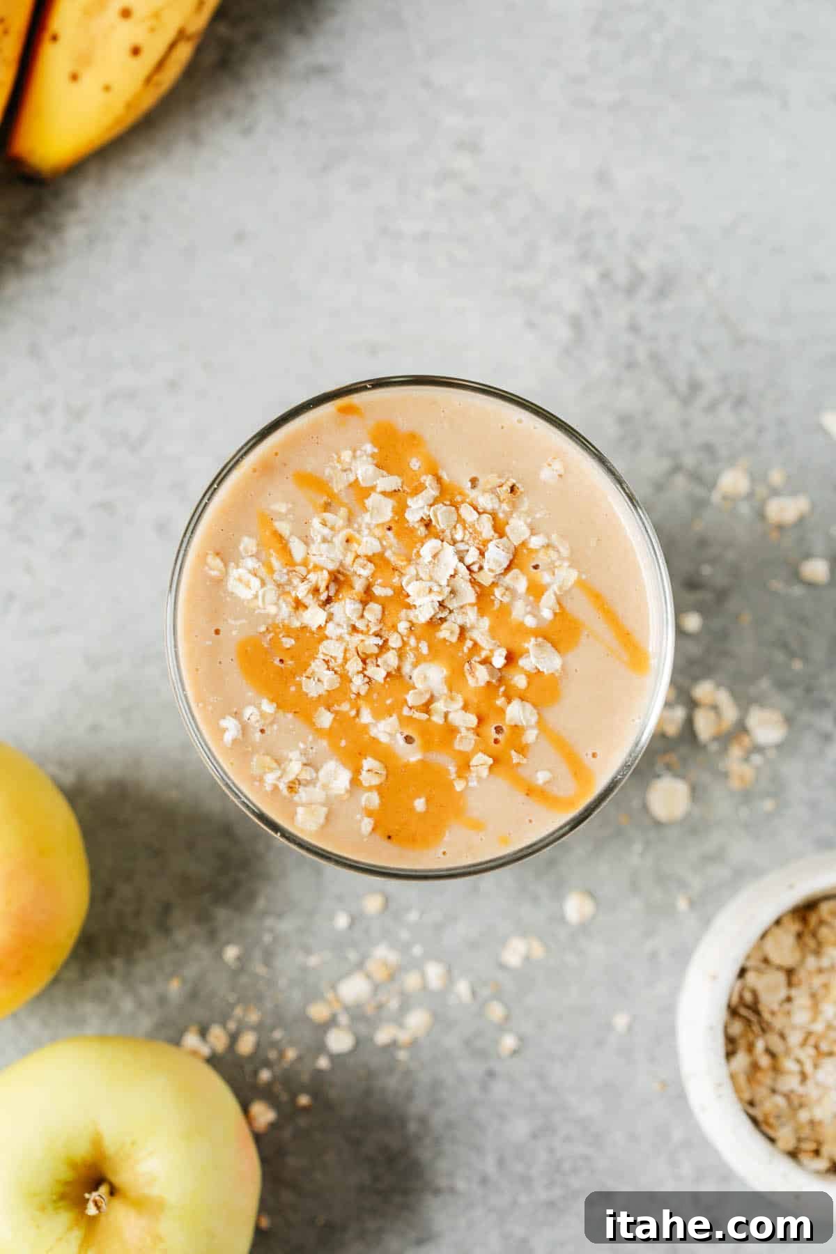 Crisp Apple Blend 3 An overhead view of a beautifully prepared cup of apple smoothie, showcasing its inviting texture and rich color, perfect for a healthy start to the day.