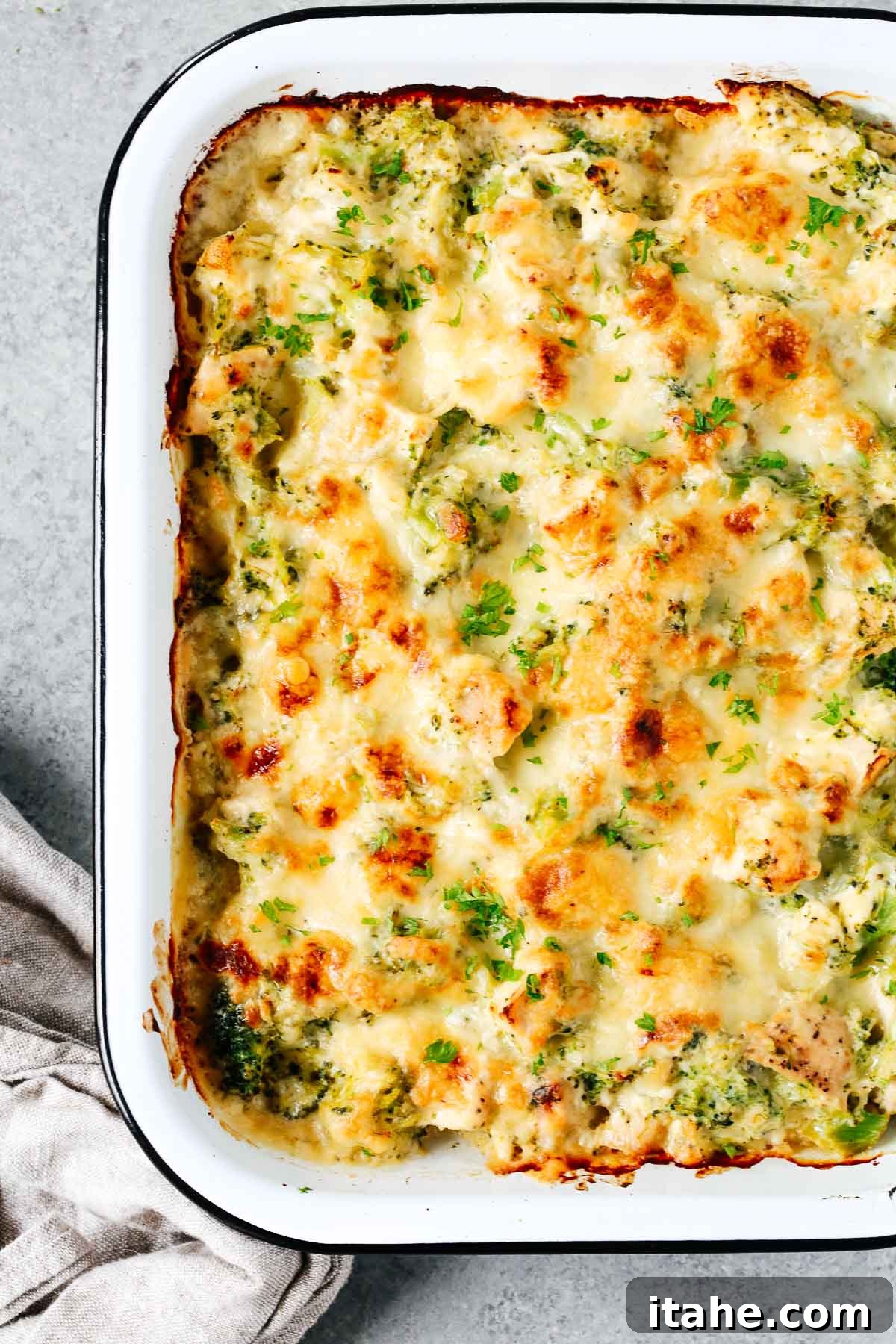 A close-up view of the baked broccoli and cauliflower casserole, showcasing its creamy texture and melted cheese.