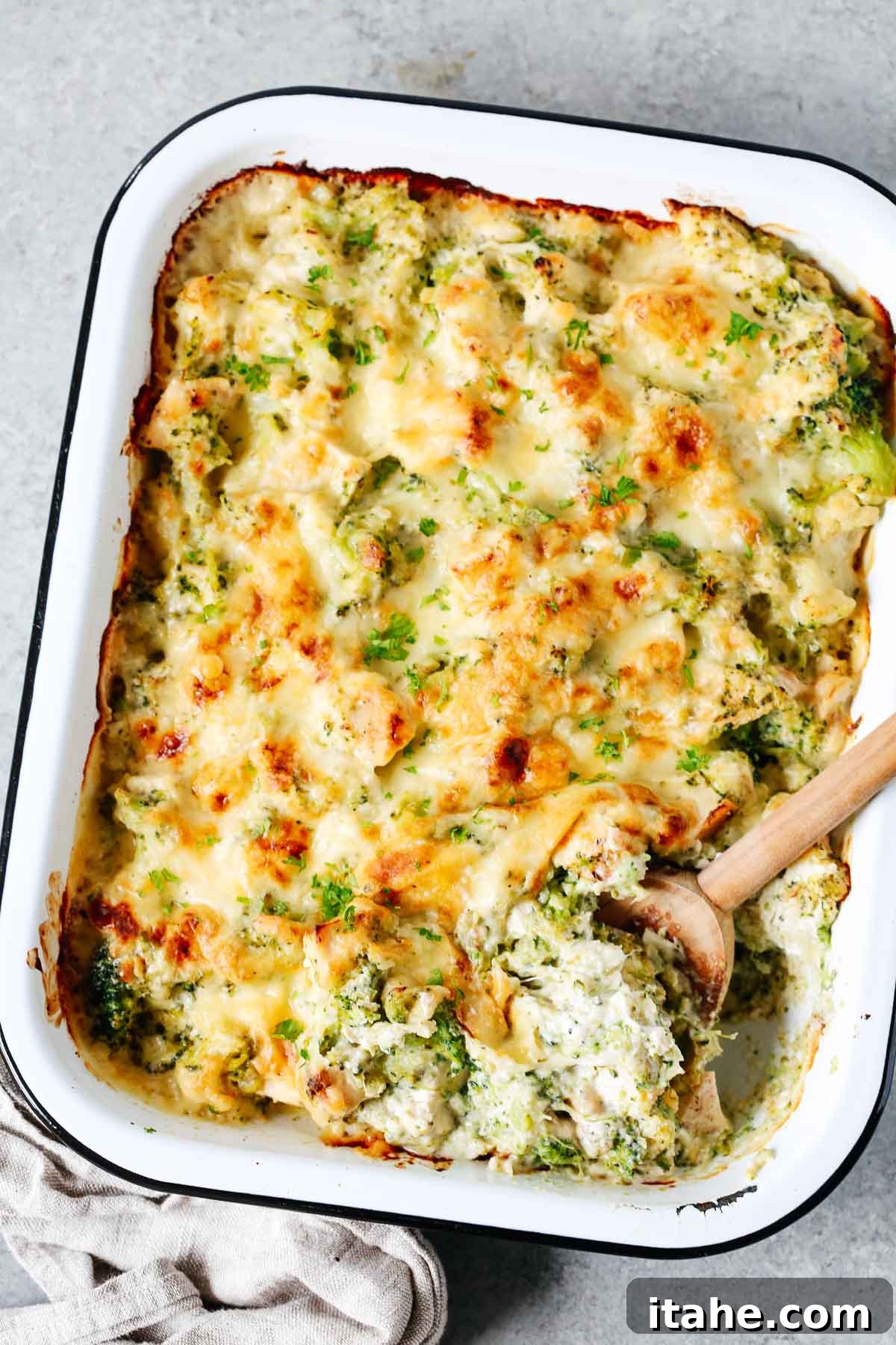 An overhead shot of a baking dish filled with the savory broccoli and cauliflower casserole, ready to serve.