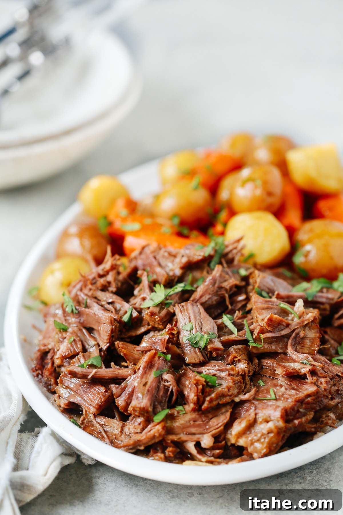 Close up of a pot roast recipe in a serving platter.