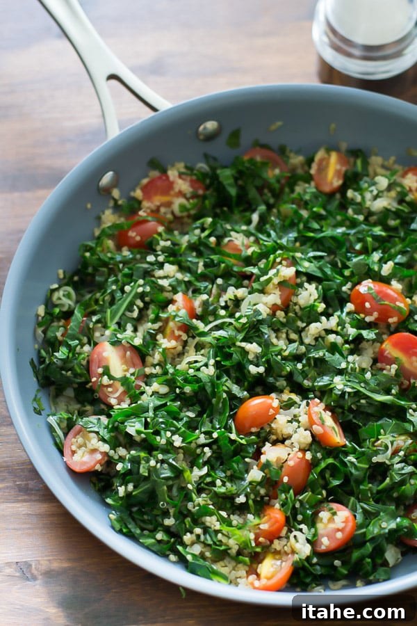 Warm Collard Quinoa Salad being mixed in a pan