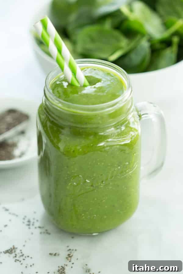 Boost Your Health with a Quick & Delicious Mango Green Smoothie Close-up of a refreshing Mango Green Smoothie, perfect for a healthy diet