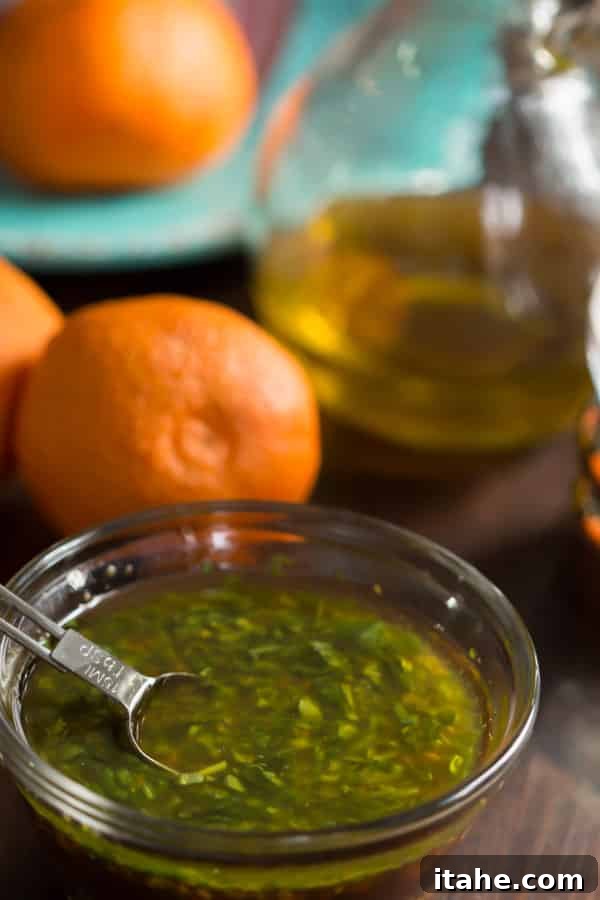 Homemade Clementine Salad Dressing: A Zesty Winter Delight Fresh Clementine Salad Dressing in a glass jar, ready to be served over a vibrant salad