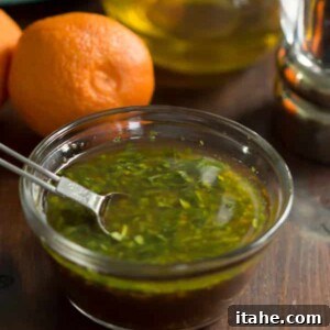 Close up view of the clementine salad dressing in a small bowl