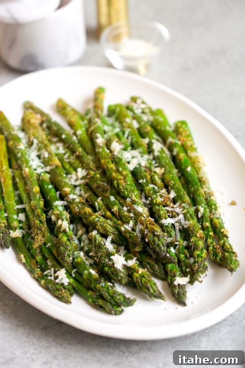 overhead view of air fryer asparagus