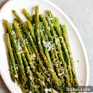 overhead view of air fryer asparagus