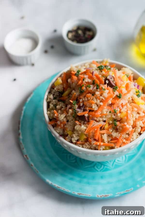 Carrot Quinoa Salad - This quinoa salad is filled with shredded carrots, red onions, bell pepper and olives. It is gluten-free, vegan, healthy and very flavourful too. Carrot Quinoa Salad - This quinoa salad is filled with shredded carrots, red onions, bell pepper and olives. It is gluten-free, vegan, healthy and very flavourful too.