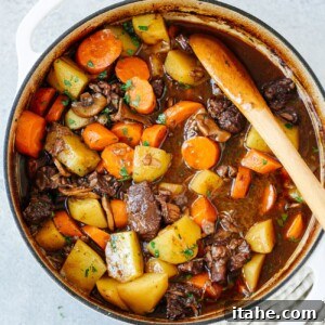 Overhead view of Dutch oven containing beef stew