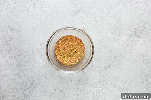overhead view of glass bowl containing dried spices