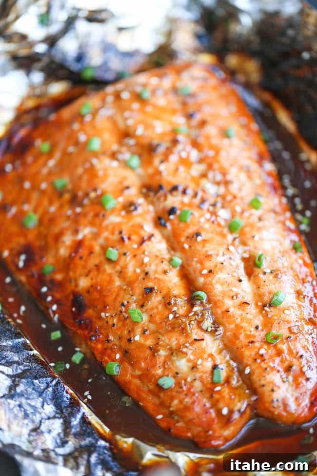 Easy Asian Salmon in Foil, perfectly cooked on a baking sheet for a simple, flavorful meal.