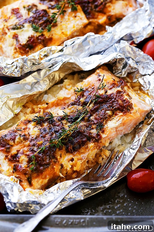 A close-up view of flavorful Pesto Salmon and Rice baked conveniently in foil.