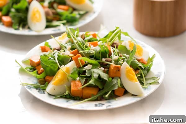 sweet-potato-arugula-salad - This Sweet Potato Arugula Salad is packed with pistachios, sweet potato, feta cheese and a delicious honey Dijon vinaigrette that pairs deliciously with arugula. sweet-potato-arugula-salad - This Sweet Potato Arugula Salad is packed with pistachios, sweet potato, feta cheese and a delicious honey Dijon vinaigrette that pairs deliciously with arugula.