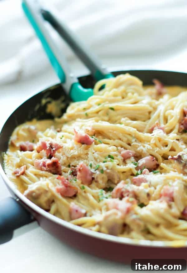 Pumpkin Alfredo Sauce with Italian Sausage Pumpkin Alfredo Sauce with Italian Sausage, a savory and hearty meal using homemade pumpkin puree