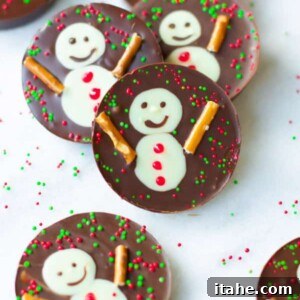 Snowman Chocolate Delights 2 Delightful Snowman Chocolate Cups ready to be enjoyed as festive holiday treats.