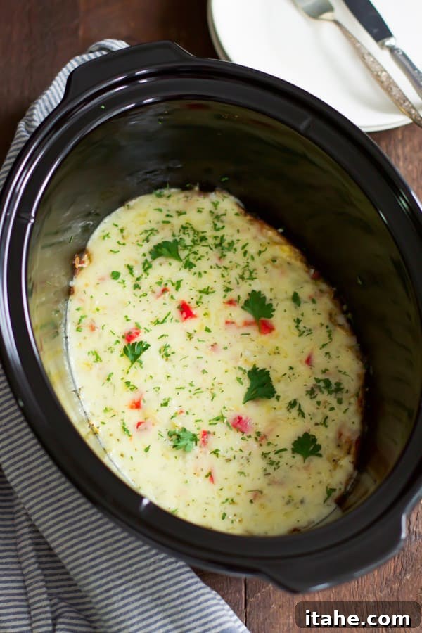 Close-up of freshly cracked Canadian eggs and ingredients for a slow cooker omelet.