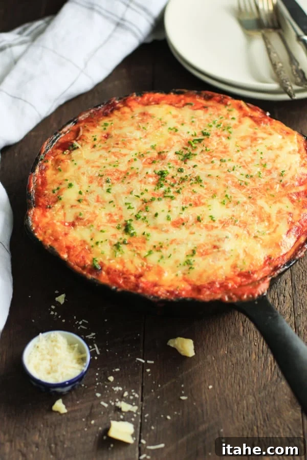 Low-carb Zucchini Lasagna Skillet Primavera Kitchen Recipe - A delicious, healthy, and easy one-pan zucchini lasagna with a rich mushroom filling.