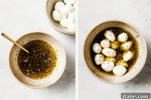 mozzarella mini balls in a bowl with olive oil and spices