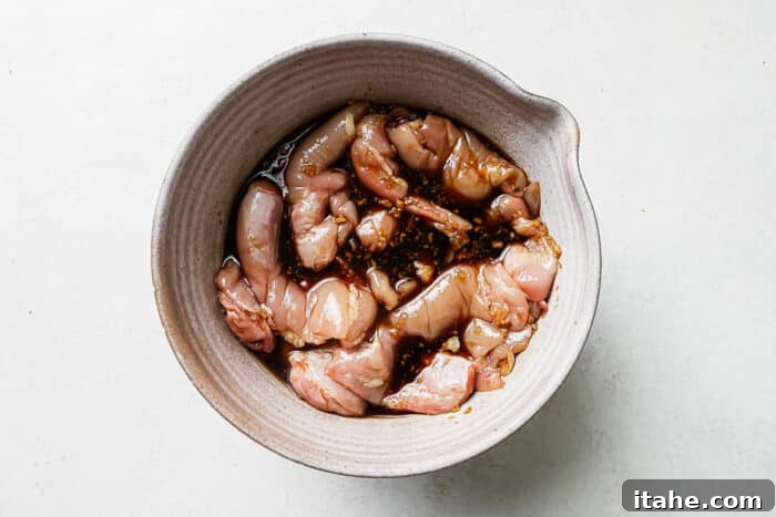 Chicken steeping in marinade. 