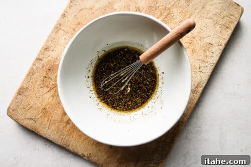 Sweet and Tangy Balsamic Chicken 12 Balsamic marinade in a white bowl.