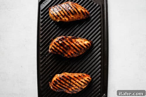 Sweet and Tangy Balsamic Chicken 14 Chicken breast on a grill.