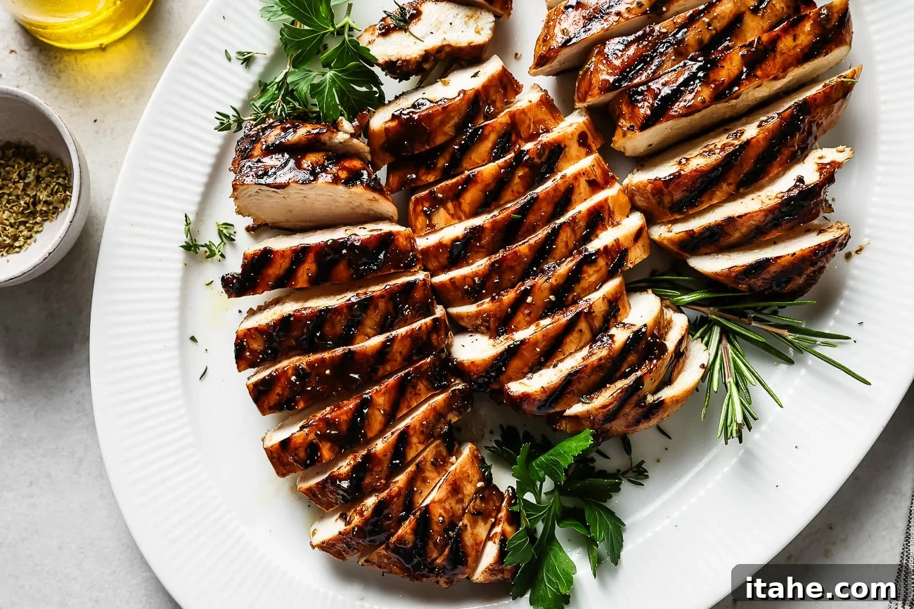 Sweet and Tangy Balsamic Chicken 9 Another view of balsamic chicken on a white plate, highlighting its delicious texture.