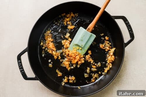 Sautéed onions in a cast iron skillet.