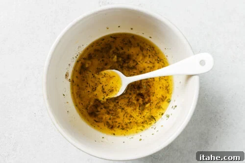 lemon butter sauce in a white bowl