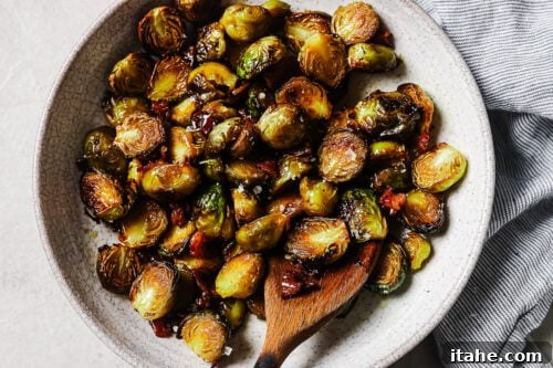 overhead view of maple bacon brussels sprouts on a plate