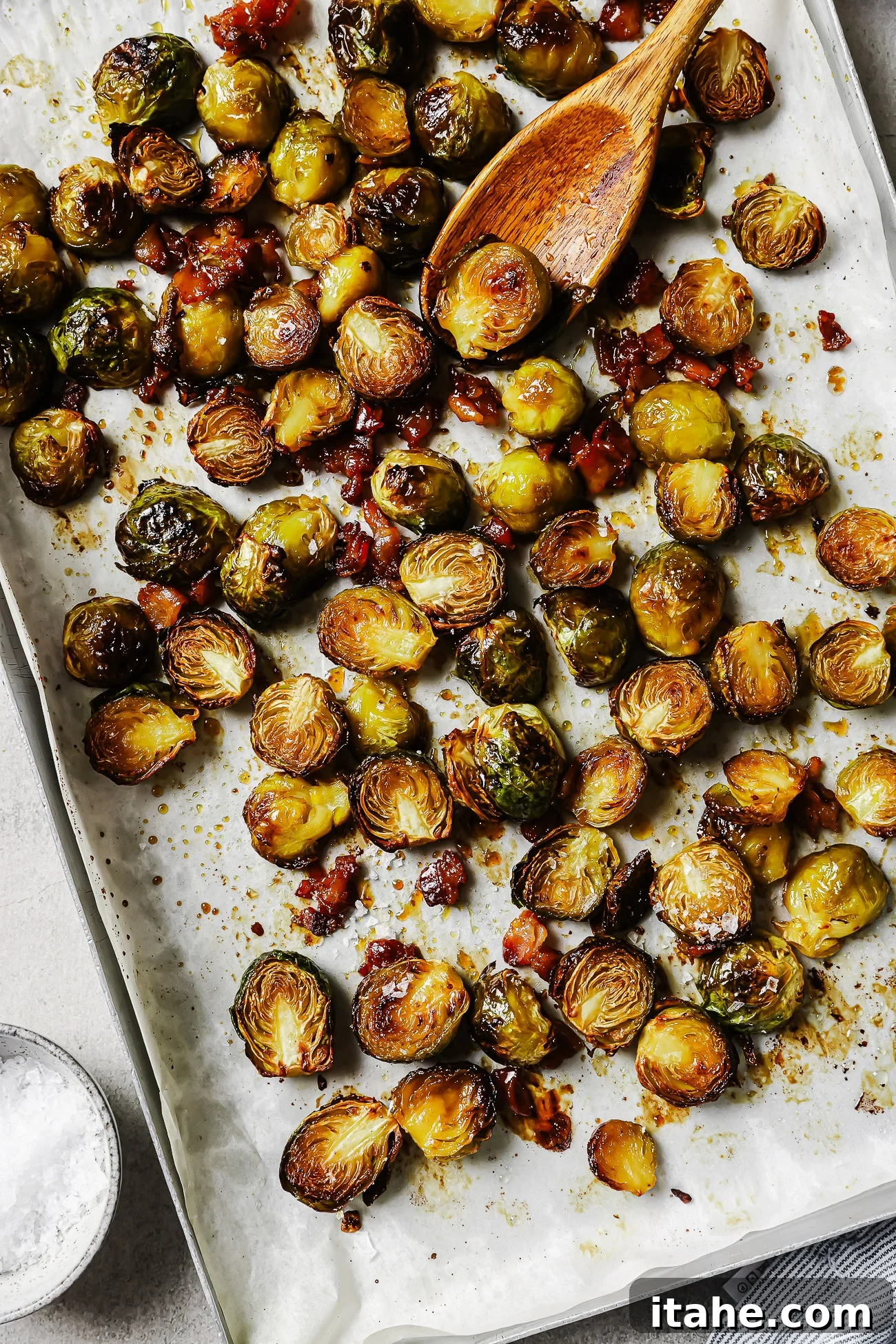Caramelized Maple Bacon Brussels Sprouts 8 Overhead view of Roasted Brussels sprouts on a baking sheet.