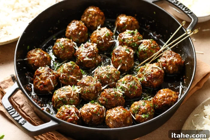 Sticky Honey Garlic Meatballs with Soy Glaze 7 closeup view of honey garlic meatballs in a cast iron skillet