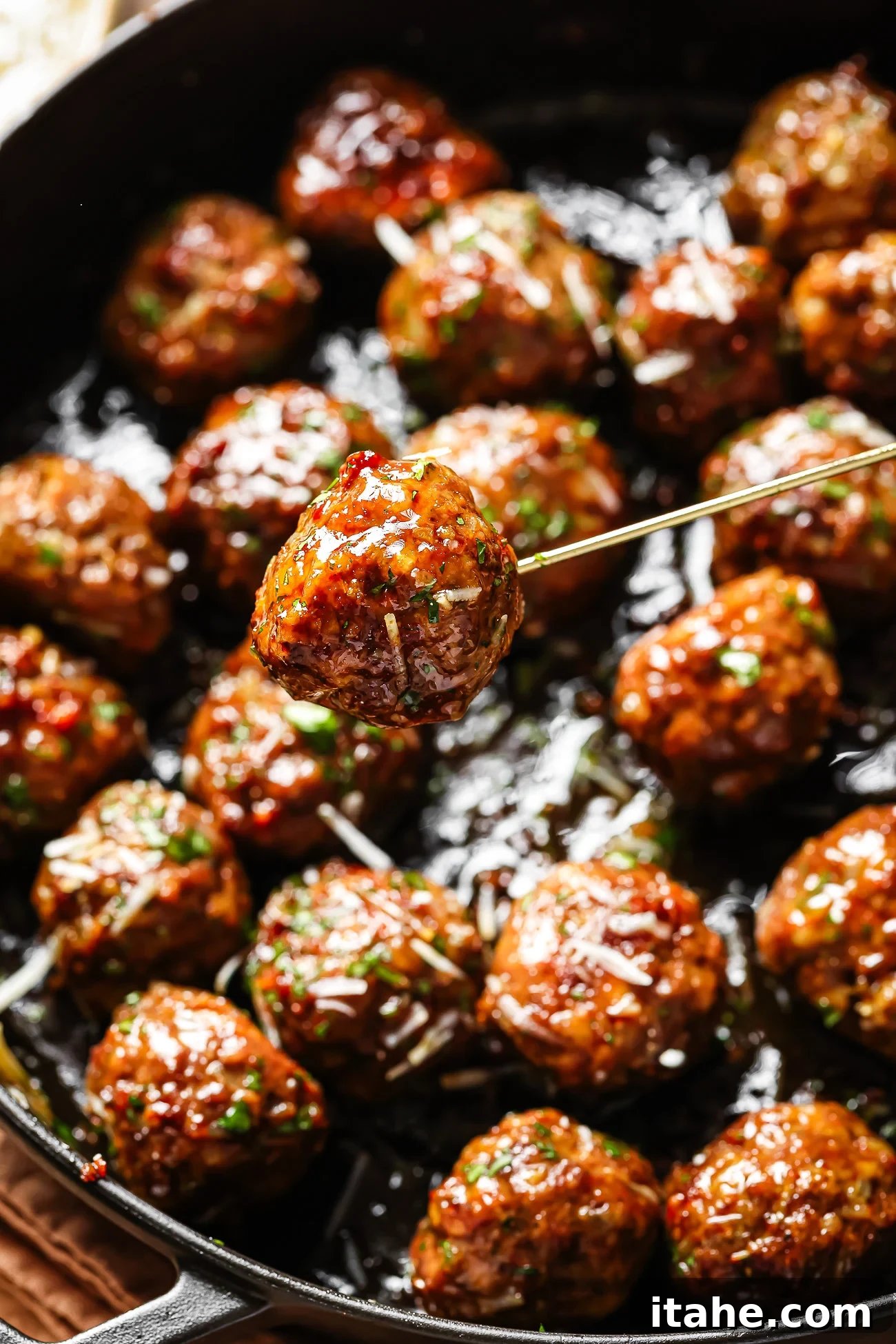 Sticky Honey Garlic Meatballs with Soy Glaze 9 closeup view of honey garlic meatnalls